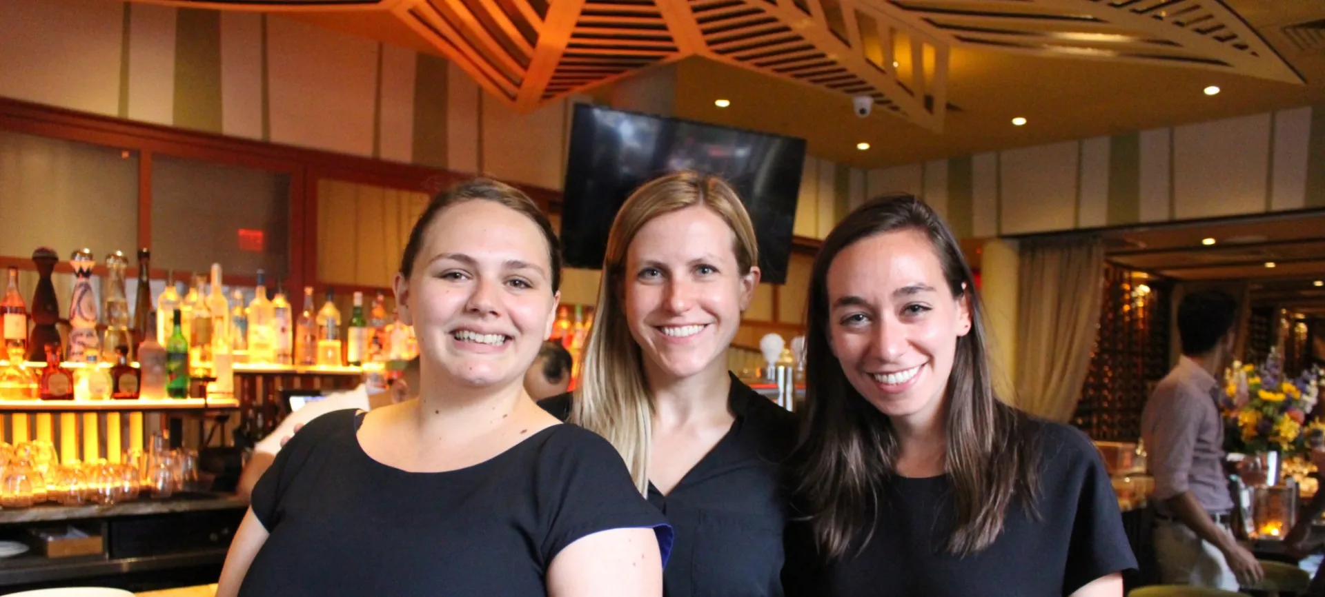 3 female alumna at a happy hour 
